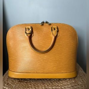 Louis Vuitton Alma yellow epi.